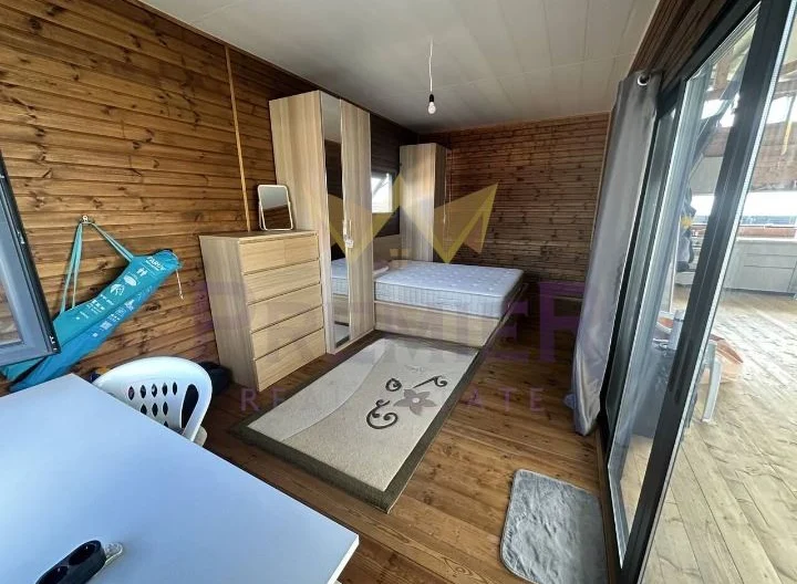 Grundstück mit Sommerhaus und Projekt für ein Massivhaus bei Arapya -  - snimka 9 - Imoti Premier