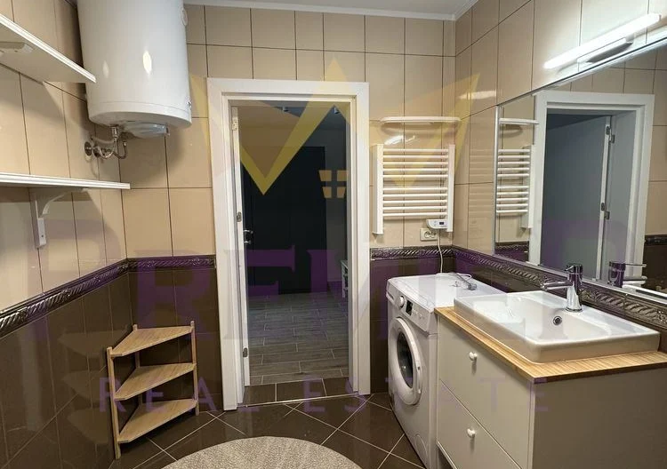 Two-bedroom apartment with a spacious loggia and private yard in a gated complex. -  - snimka 7 - Imoti Premier
