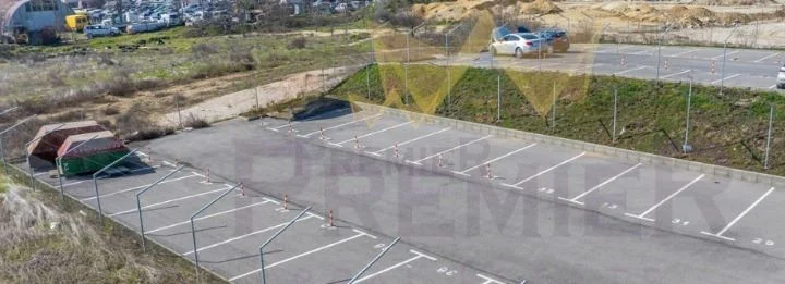 🚗 УНИКАЛНО ИНВЕСТИЦИОННО ПРЕДЛОЖЕНИЕ // НАЗЕМЕН ПАРКИНГ с 30 бр. Паркоместа // гр. Варна -  - снимка 1 - Имоти Премиер